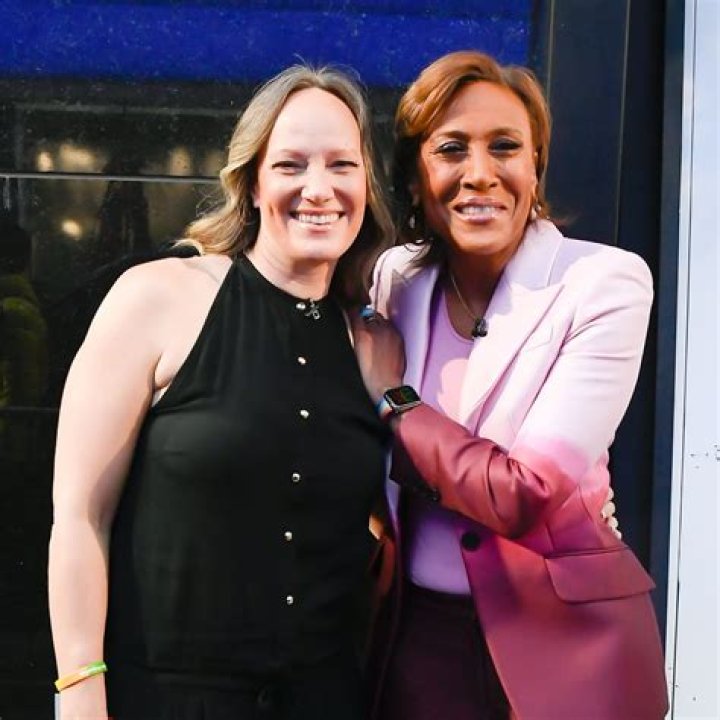 Amber Laign's Hair: Debunking Wig Speculations in Her 20-Year Journey with Robin Roberts - SarkariResult